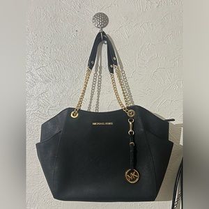 Black Michael Kors Purse. Bought this for my sister, but she already had one.